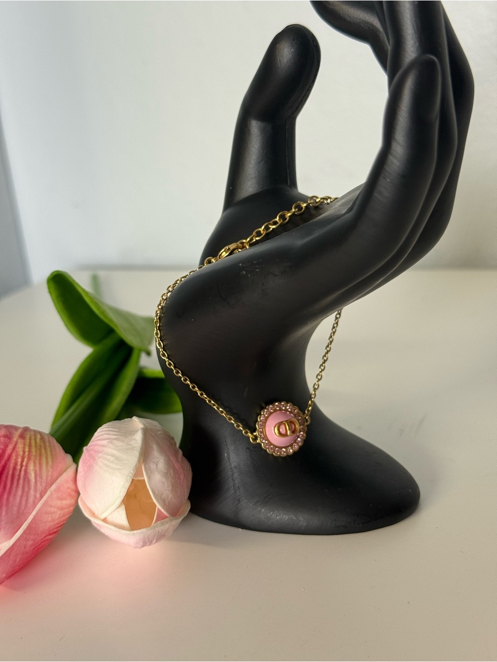 Christian Dior CD Gold-Plated Bracelet with Pink Crystals